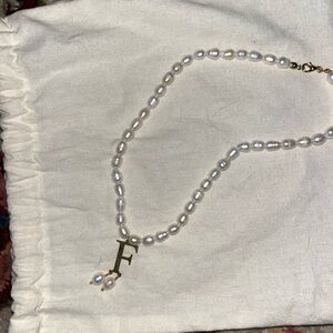 Pearl necklace with F